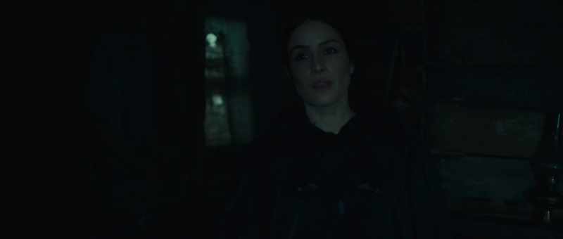 Watching from the shadows while she