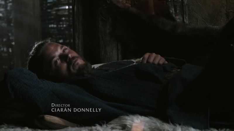 (water churns as Ragnar rows)