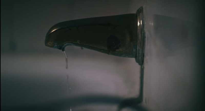 (water trickling) (tense music)