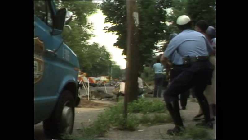 We are under fire. Back up. - Back up by the car. Back up