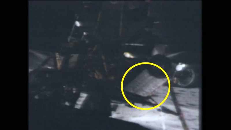 We can see that the reflection of his white suit