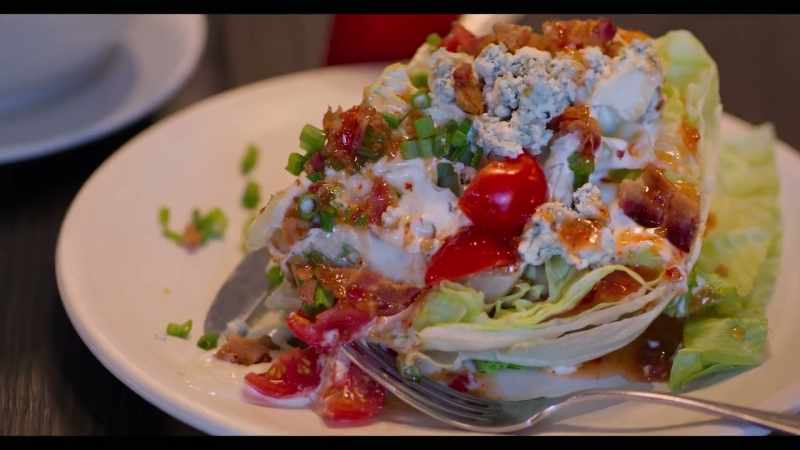We cover it with our house-made buttermilk dressing