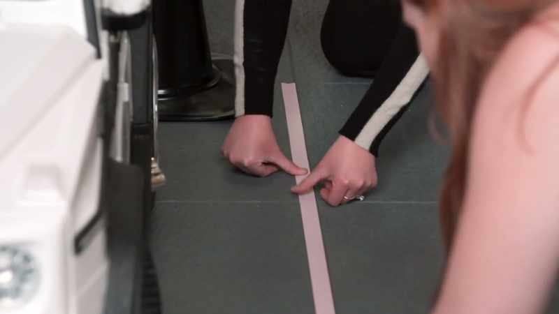 We found some tape that we can lay down in the garage to create parking spaces