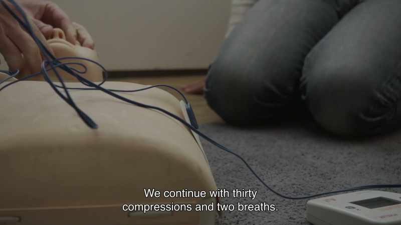 We perform 30 compressions, then two breaths