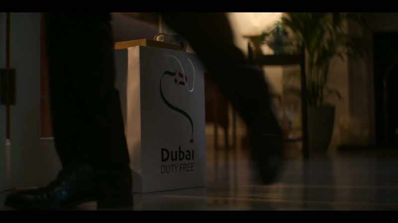 We placed various accessories like a Dubai duty free bag