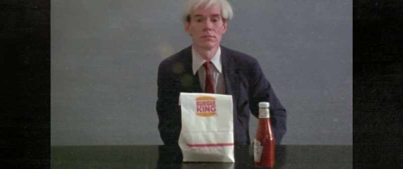 We see Andy in front of this very ordinary table