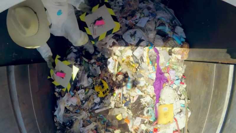WE WERE TESTING WHETHER ONE IN A GARBAGE TRUCK