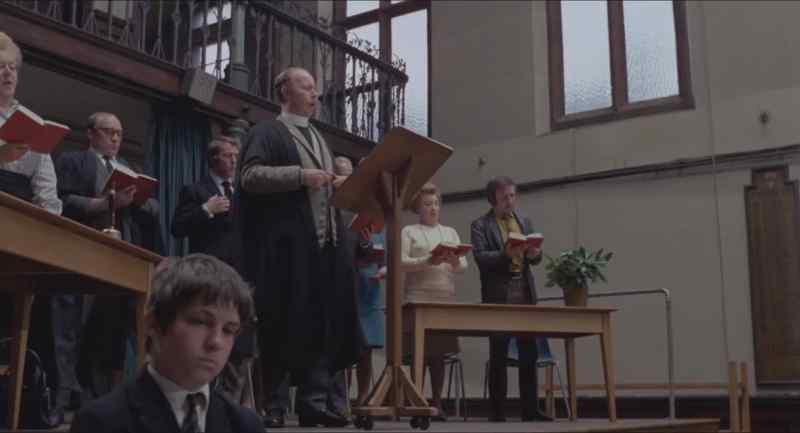 We will now sing hymn number