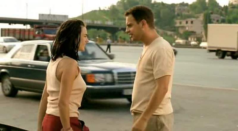 We'll do the old game The first car that stops decides our destination