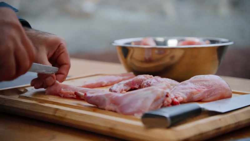 We're going to grill the rabbit meat on hemlock skewers