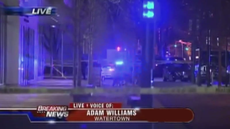 We're seeing police running, guns drawn
