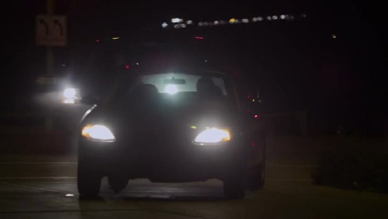 We've got a dark-colored 4-door sedan moving