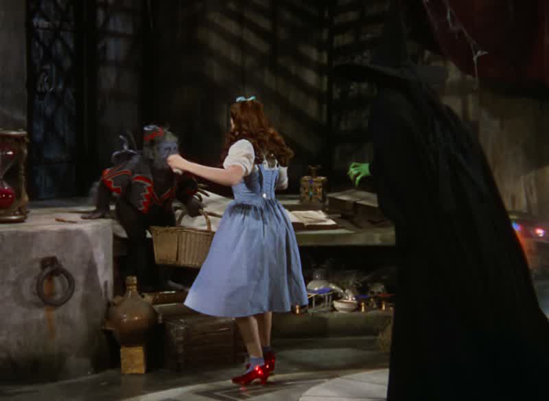 What are you gonna do with my dog Give him back to meAll in good time my little prettyAll in good time Please give me back my dogCertainly certainlywhen you give me those slippersBut the Good Witch