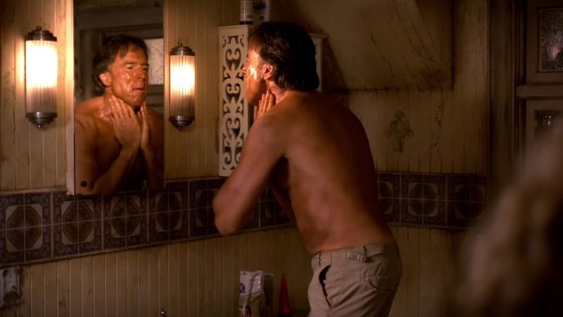 What the hell are you doing? - Trying to get this damn tan off