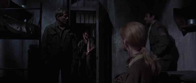 What the hell's going on? Who brought her in here?