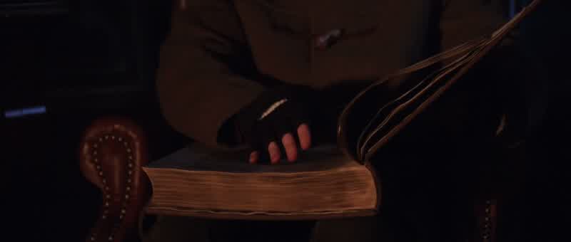 What have you got thereA Gutenberg BibleIt was in the rare books roomYou think god's gonna save youNo I don't believe in godYou're holding onto that Bible pretty tightI'm protecting itThis Bible is
