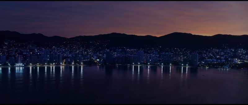 When you come into Acapulco Bay at night on a sailboat
