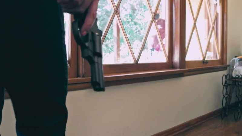 When she pulls out the gun