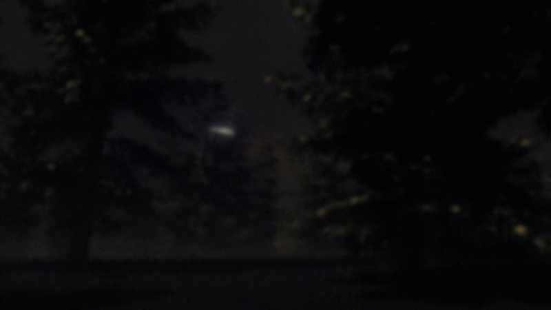 When suddenly, a bright light appears among the trees