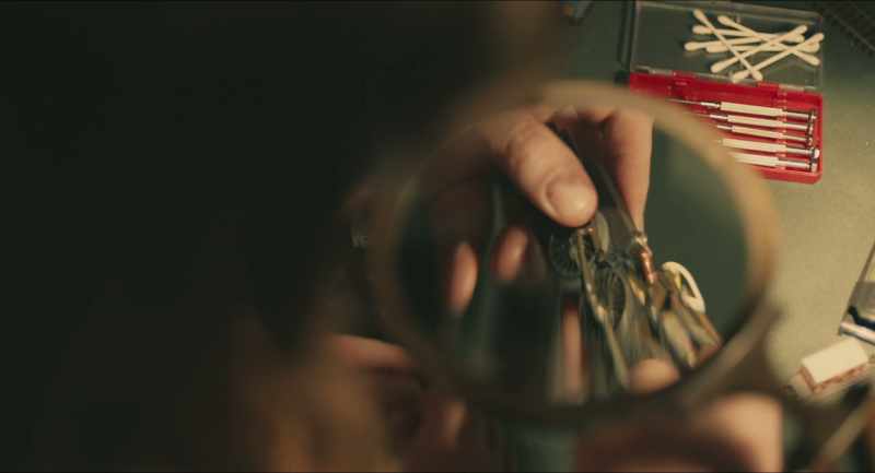 When the motor operates, it turns this screw