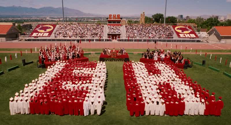 East High is a place where teachers encouraged us to break the status quoAnd define ourselves as we chooseWhere a jock can cook up a mean crème brûléeAnd the brainiac can break down on the dance