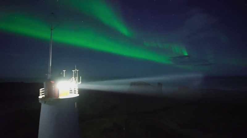 While the lights of the aurora play above