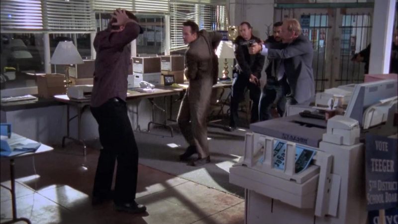 Whitman, touch that gun and you're dead! - Hands on your head! Hands on your head!