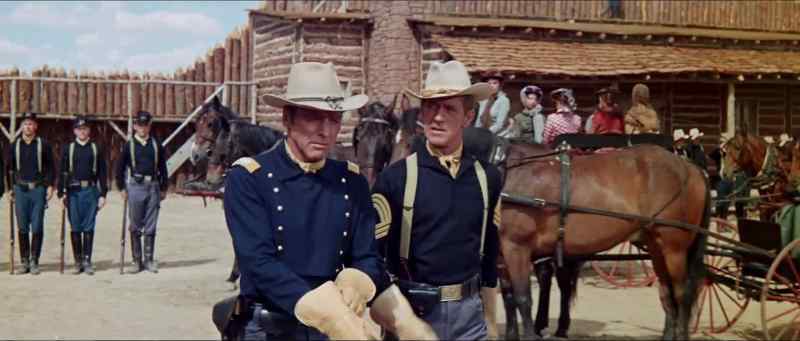 Who are those men at the gate?