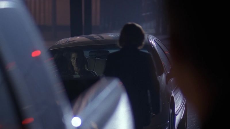 Who's that, in Agent Scully's car?