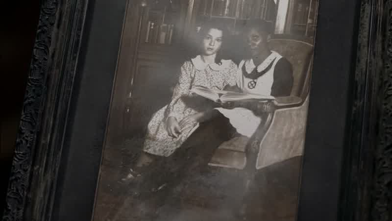 Who's that with her?
