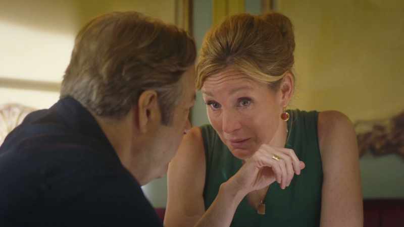 Whose wife now knows what's going on, knows Delphine's name