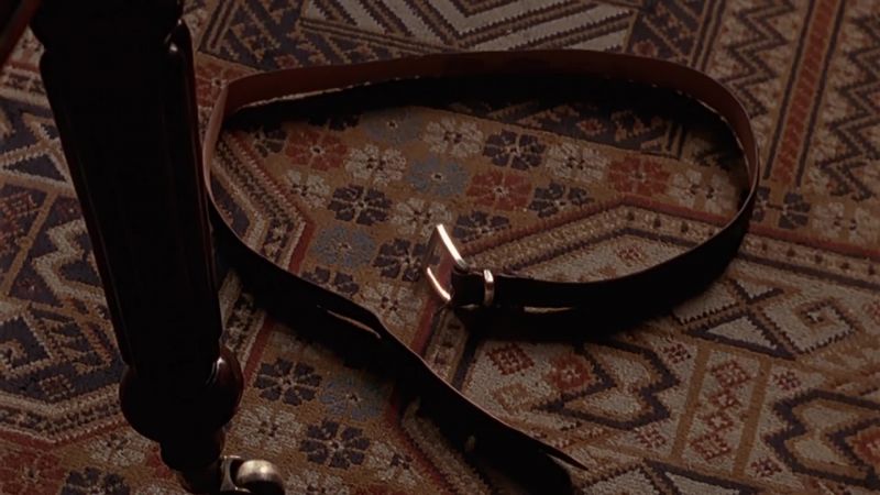 Why would a man take off his belt just before someone shoots him, huh?
