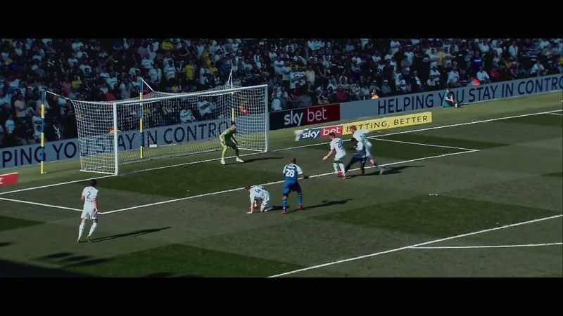 Wigan come forward again, it's knocked back across goal