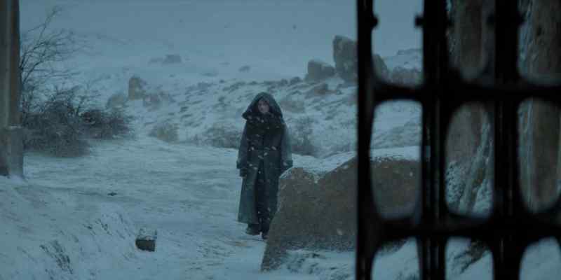 (wind howling)