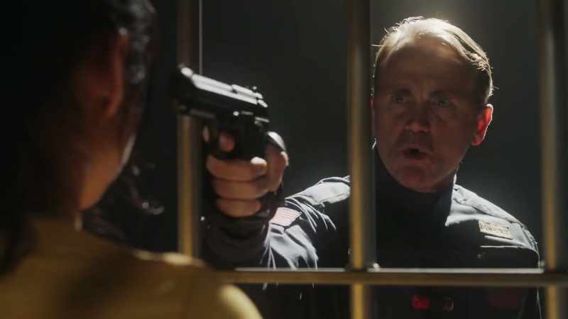 With a gun