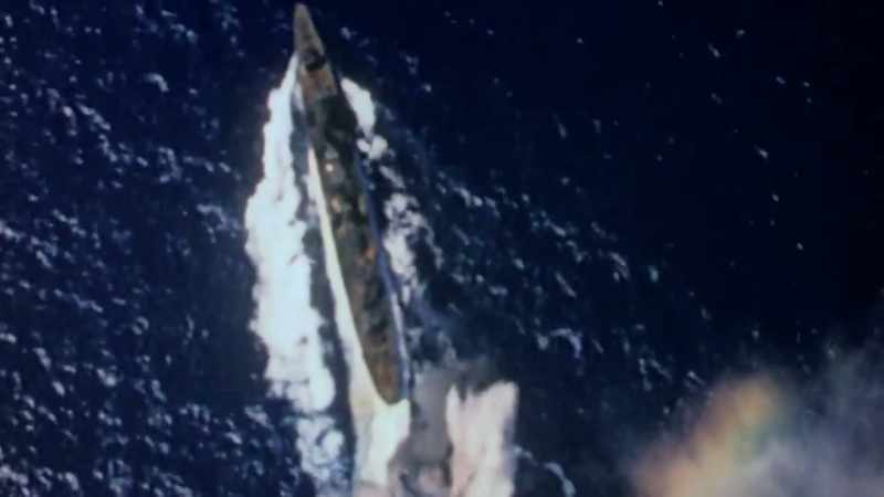 WITH BOMBS FROM ABOVE AND TORPEDOES FROM BELOW