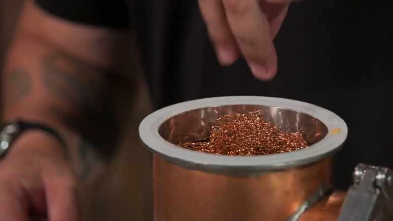 With copper scrubber