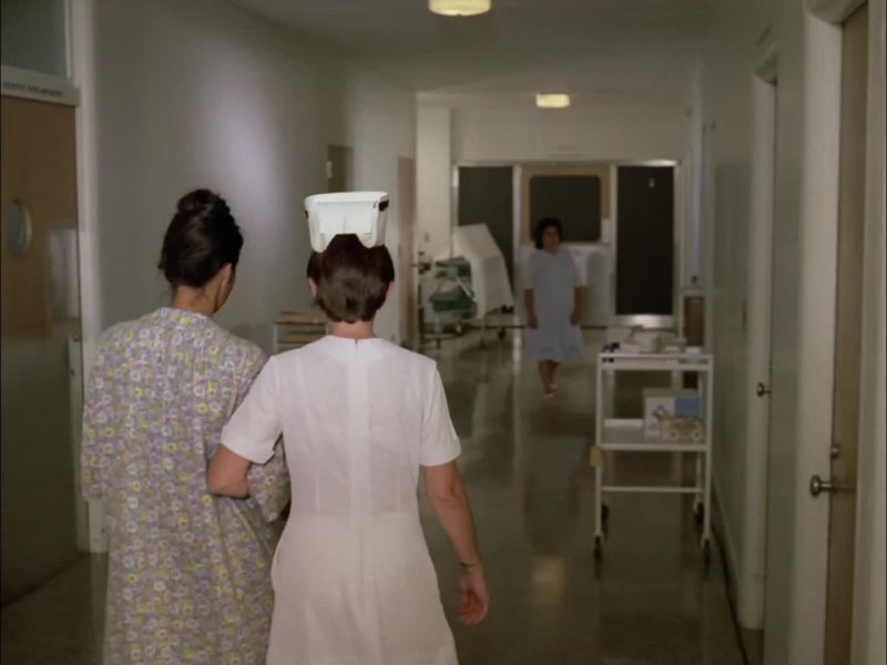 Woman: DR. MACKLIN, TELEPHONE, PLEASE