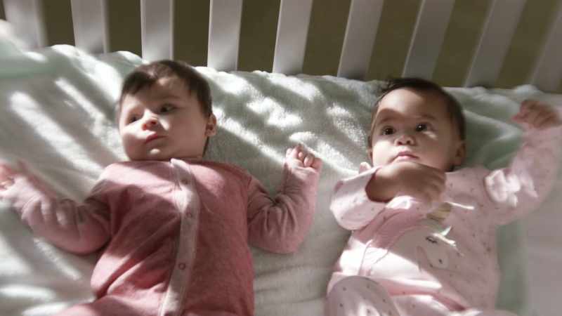 Woman: Leo, Kari, meet your daughter -- Iris