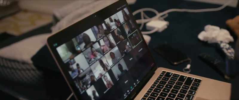 WOMAN (over computer): Love you, Thalie
