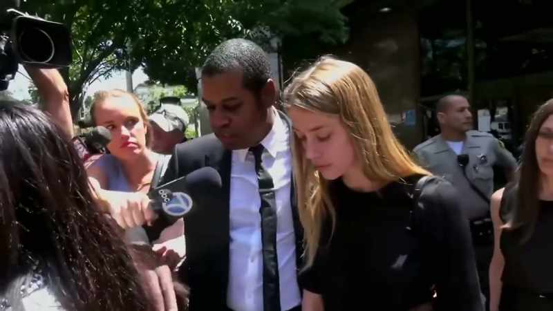WOMAN: She says Johnny smashed her face with an iPhone