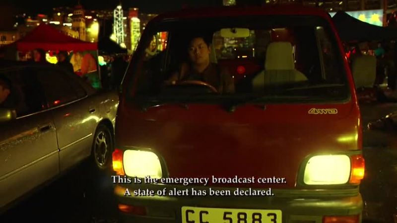 [Woman speaking Chinese on radio]