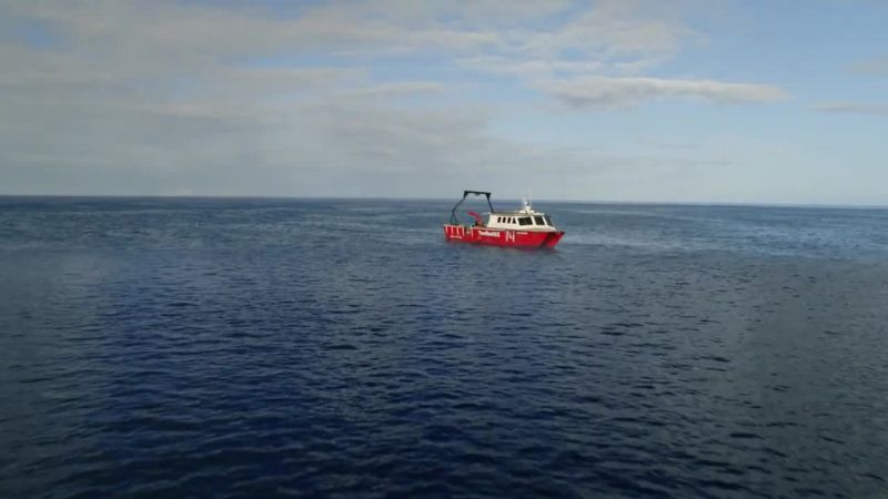 WOMAN: This is the Neptune Four research team