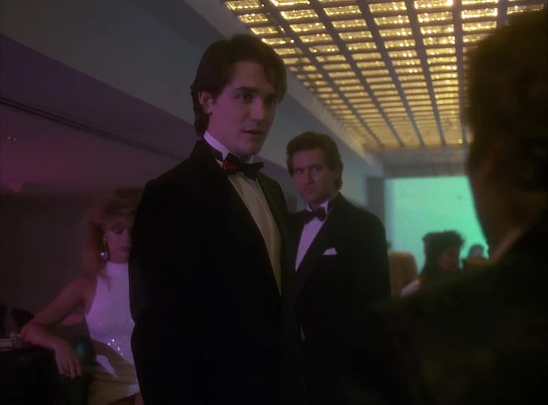 WOMAN: Your martini, sir