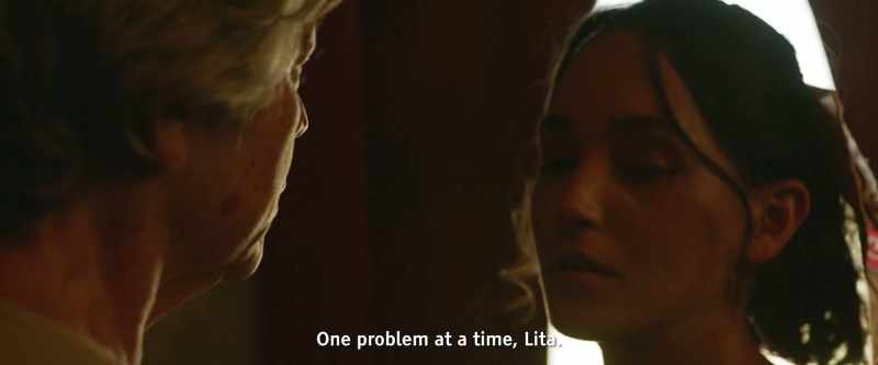 (women chatting in foreign language)