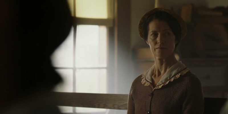 [women murmuring]