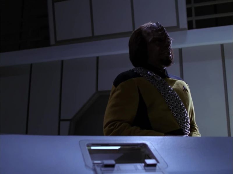Worf to Bridge. PICARD [OVER COM]: Go ahead