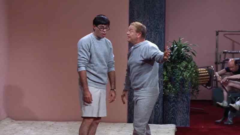 Wrong way, sir. This is the gym. I take it you're new?