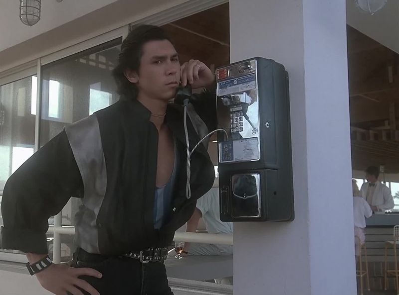 Yeah. Patch me into Vice— Detective Crockett. It's an emergency