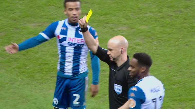 Yellow card. -[crowd boo and heckle]